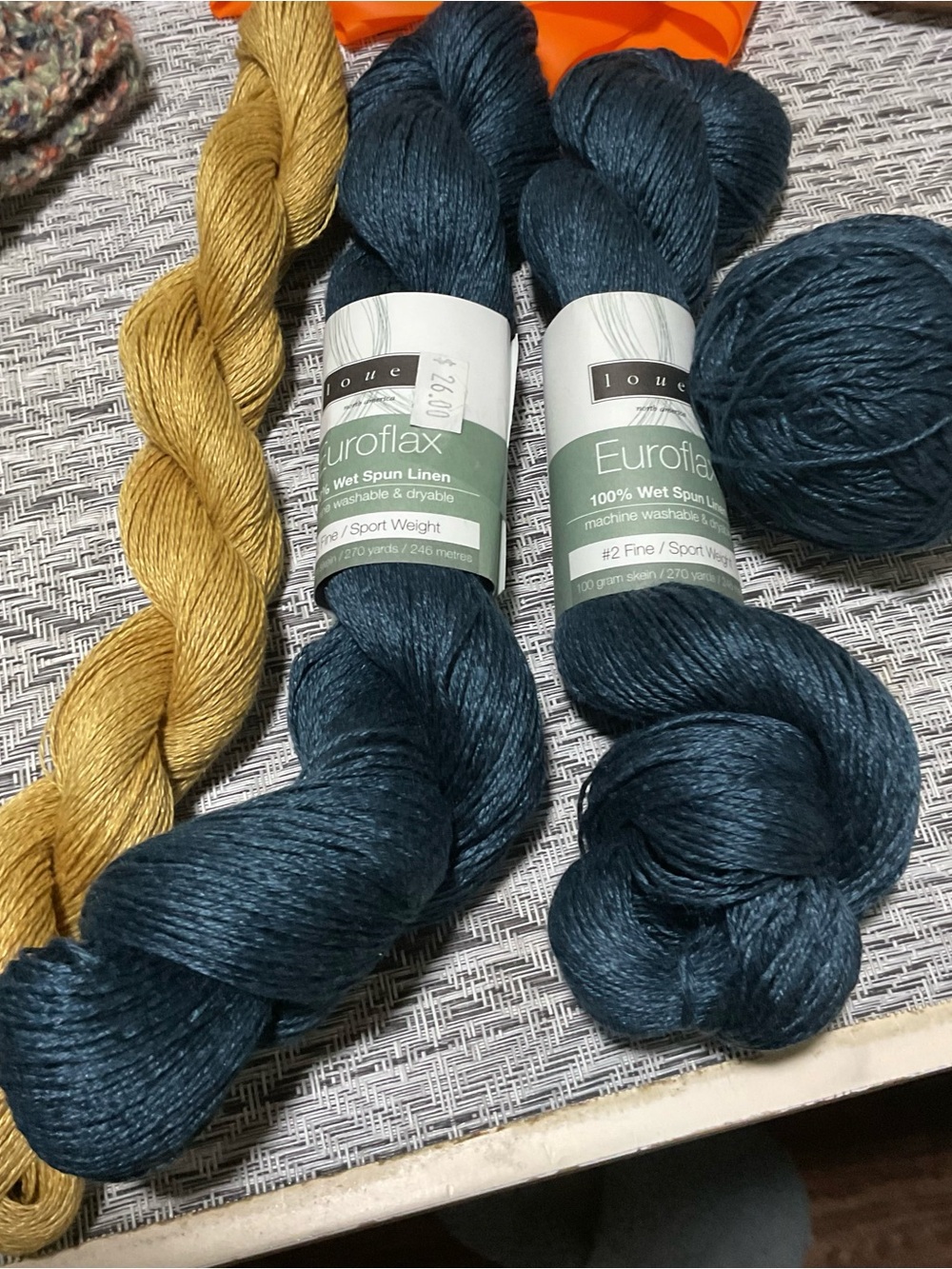 Loue Euroflax 100% wet spun linen.
#2 fine. Sport weight 
100 gram skein